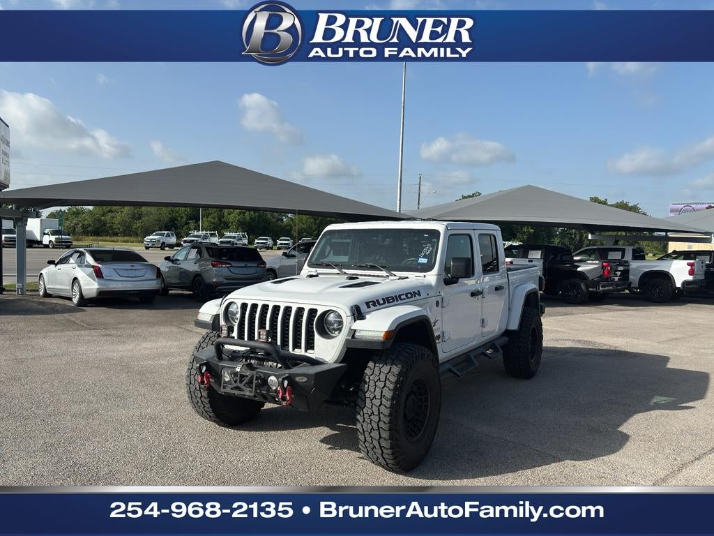 2022 Jeep Gladiator Rubicon in White — front three-quarter view