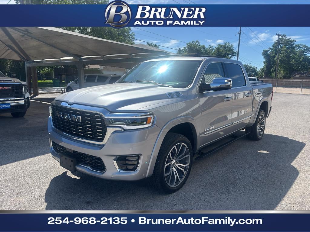2025 RAM 1500 Tungsten Crew Cab 4x4 5'7" Box in Silver — front three-quarter view