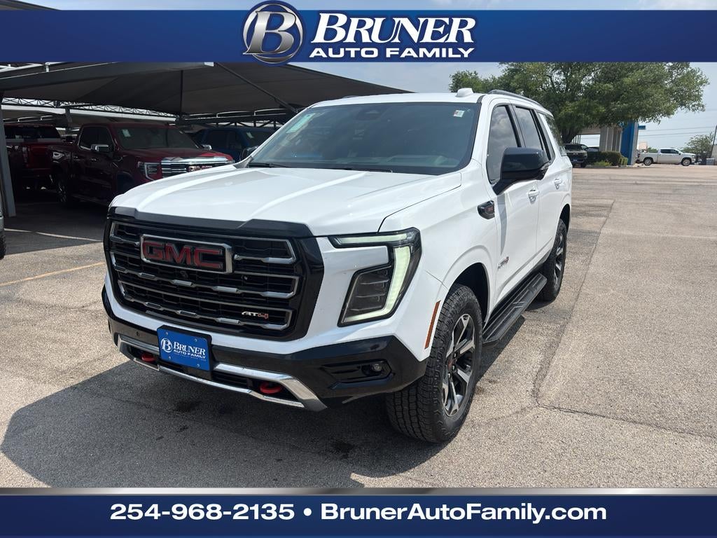 2026 GMC Yukon AT4 in Summit White — front three-quarter view