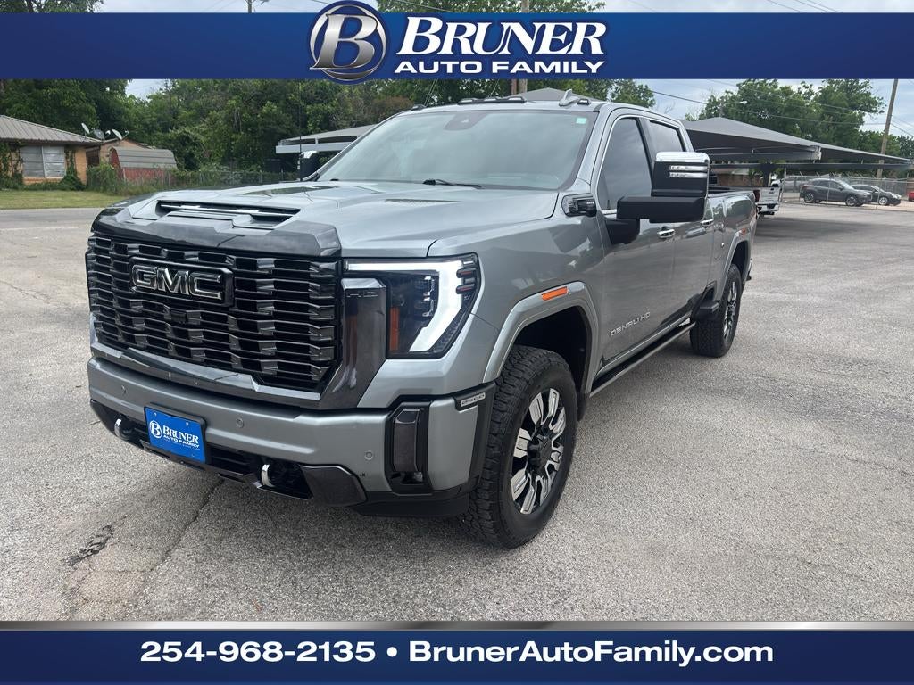 2024 GMC Sierra 2500 HD Denali Ultimate in Sterling Metallic — front three-quarter view