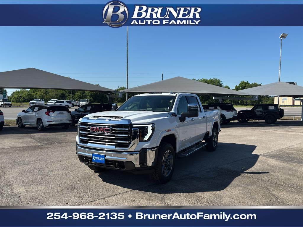 2026 GMC Sierra 2500 HD SLT in Summit White — front three-quarter view