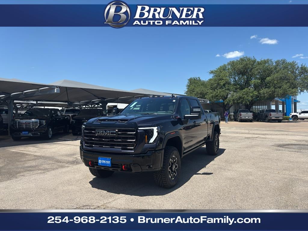 2026 GMC Sierra 2500 HD AT4X in Titanium Rush Metallic — front three-quarter view