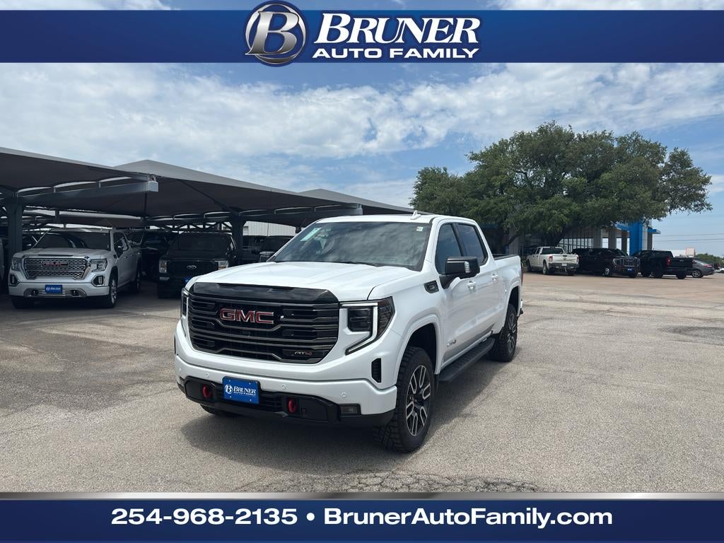 2026 GMC Sierra 1500 AT4 in Summit White — front three-quarter view