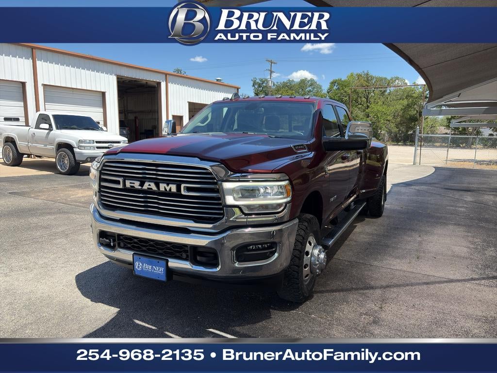 2024 RAM 3500 Laramie in Delmonico Red Pearlcoat — front three-quarter view