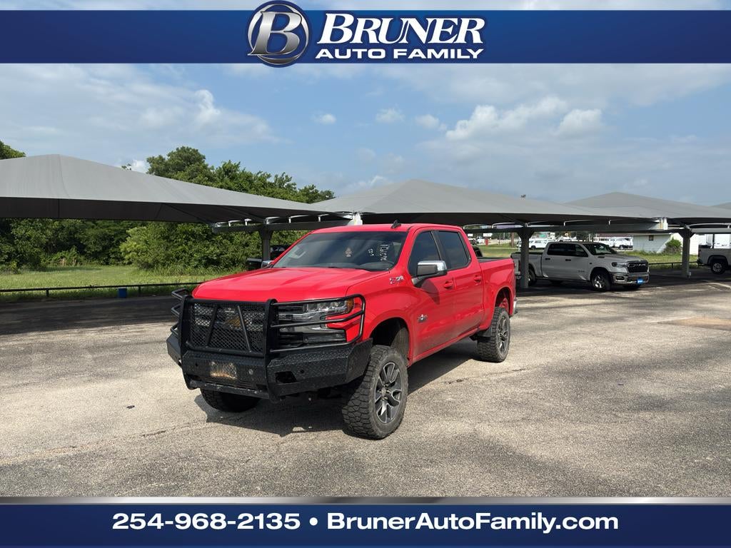 2019 Chevrolet Silverado 1500 LT in Red Hot — front three-quarter view