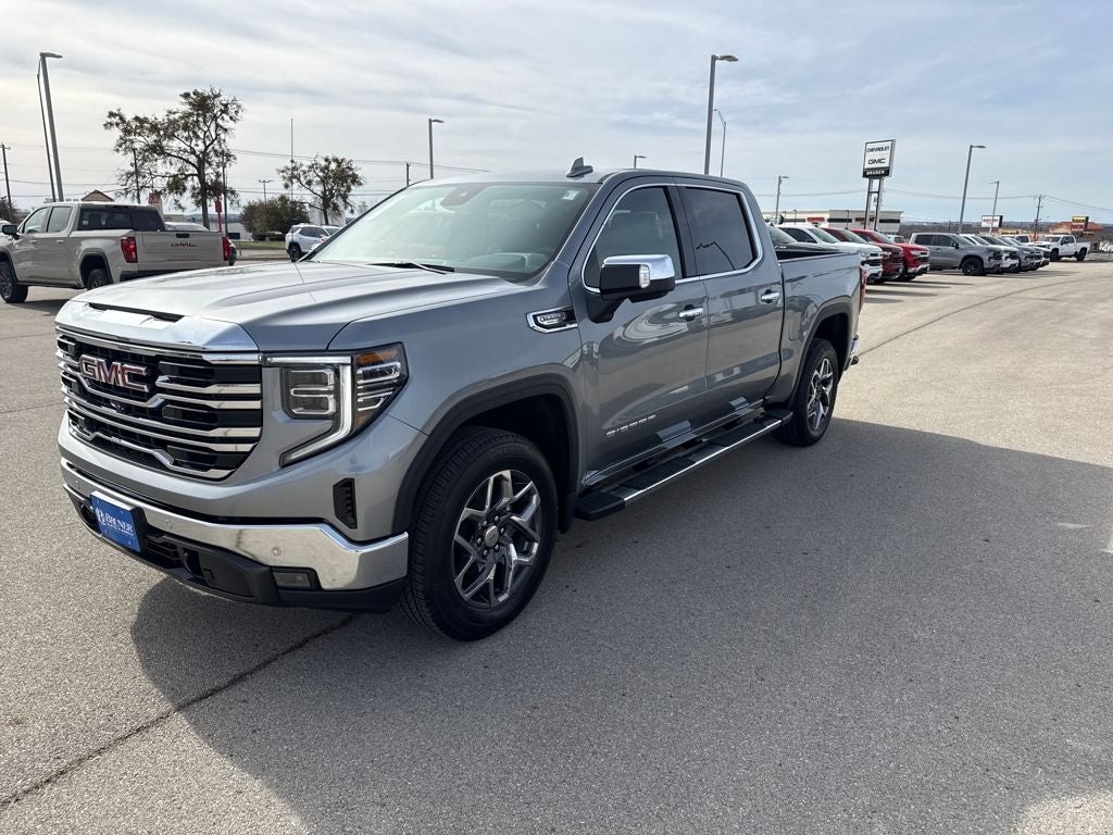 2026 GMC Sierra 1500 SLT in Sterling Metallic — front three-quarter view