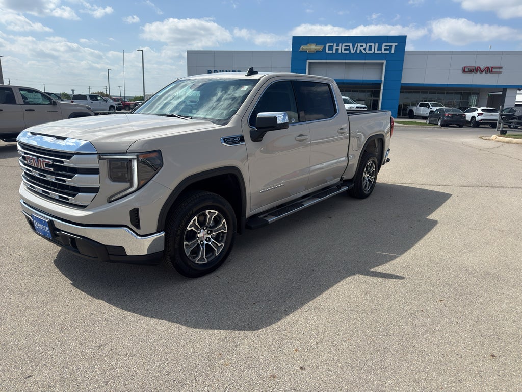 2026 GMC Sierra 1500 SLE in Coastal Dune — front three-quarter view