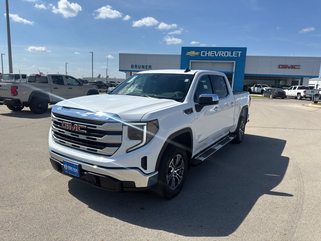 2026 GMC Sierra 1500 SLE in Summit White — front three-quarter view