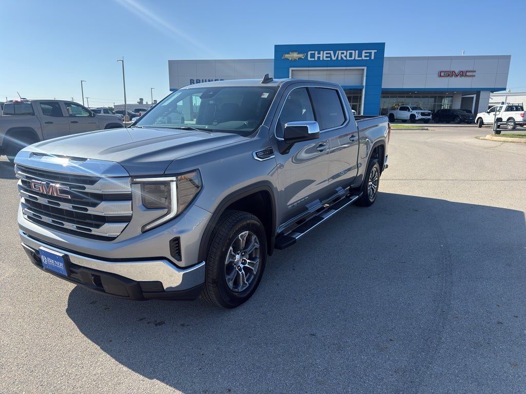 2026 GMC Sierra 1500 SLE in Sterling Metallic — front three-quarter view