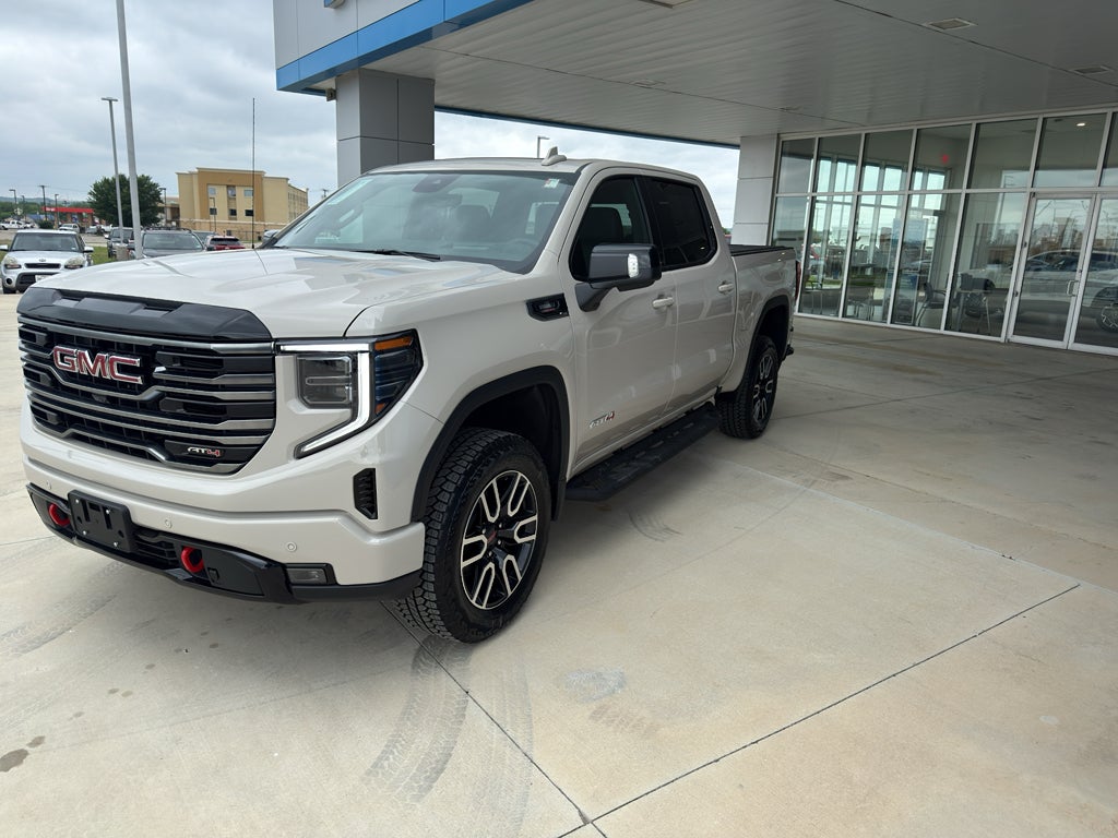 2026 GMC Sierra 1500 AT4 in Coastal Dune — front three-quarter view
