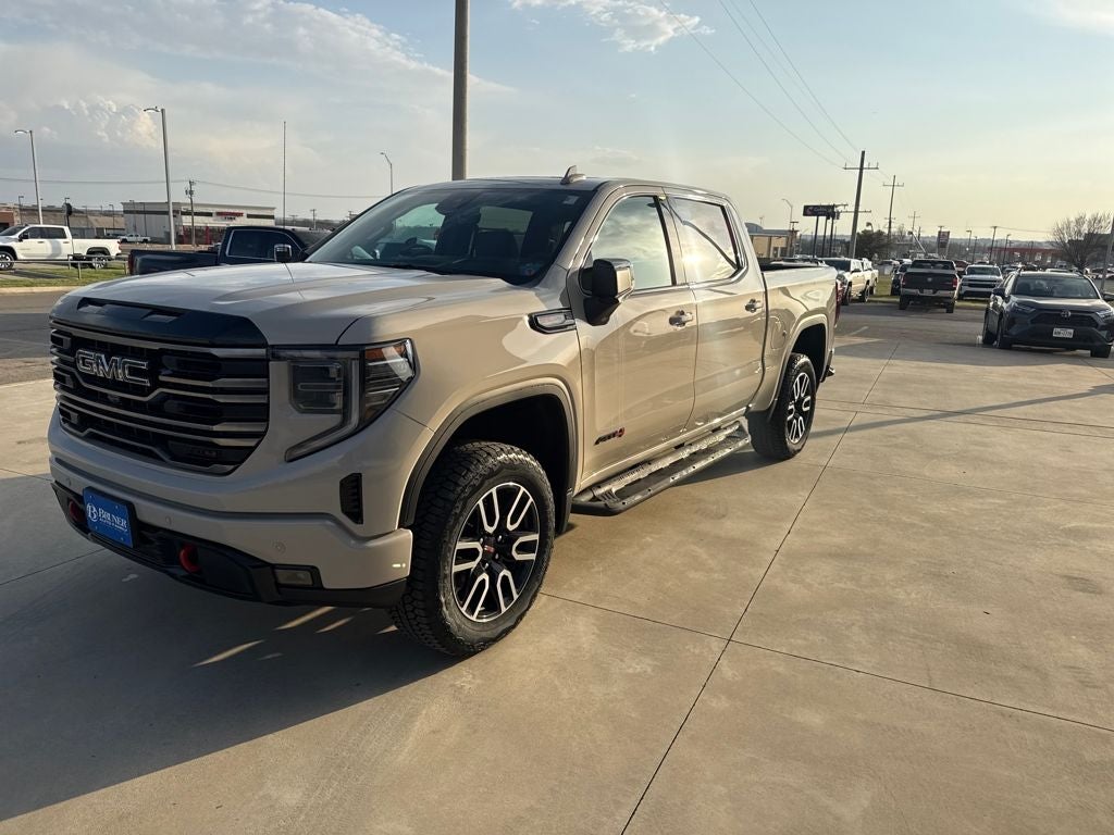 2026 GMC Sierra 1500 AT4 in Coastal Dune — front three-quarter view